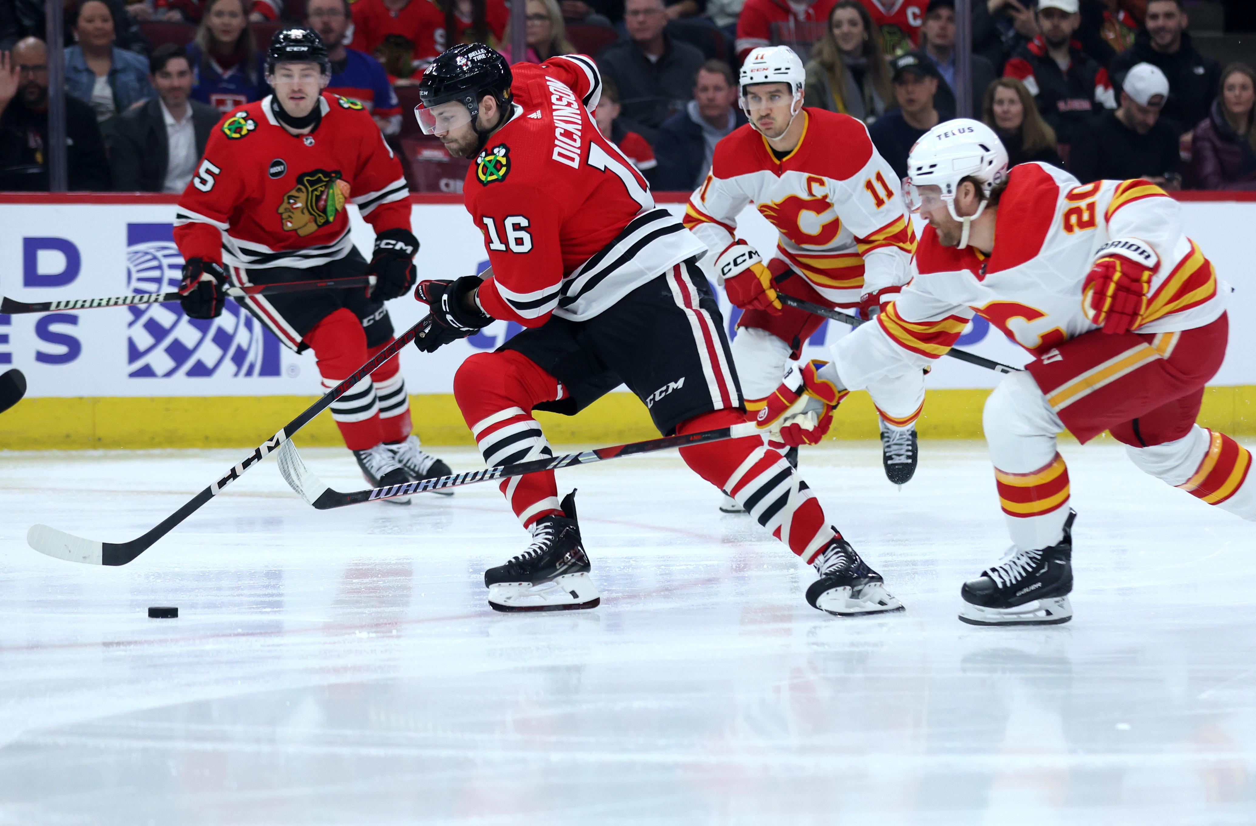 Chicago Blackhawks center Jason Dickinson (16) makes a move in the first period of a game against the Calgary Flames at the United Center in Chicago on March 26, 2024. (Chris Sweda/Chicago Tribune)