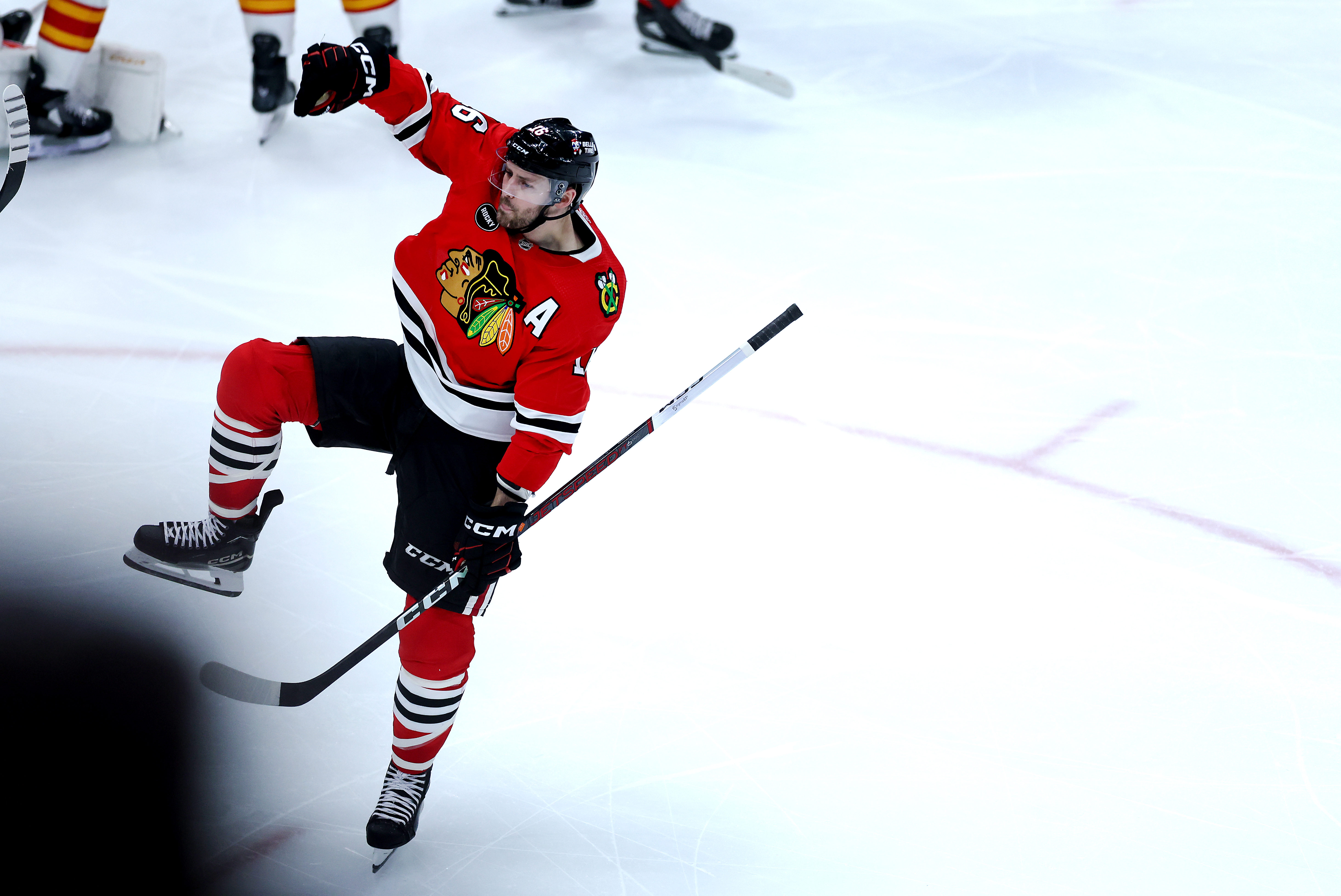 Chicago Blackhawks center Jason Dickinson (16) celebrates after scoring a goal in the third period of a game against the Calgary Flames at the United Center in Chicago on March 26, 2024. (Chris Sweda/Chicago Tribune)