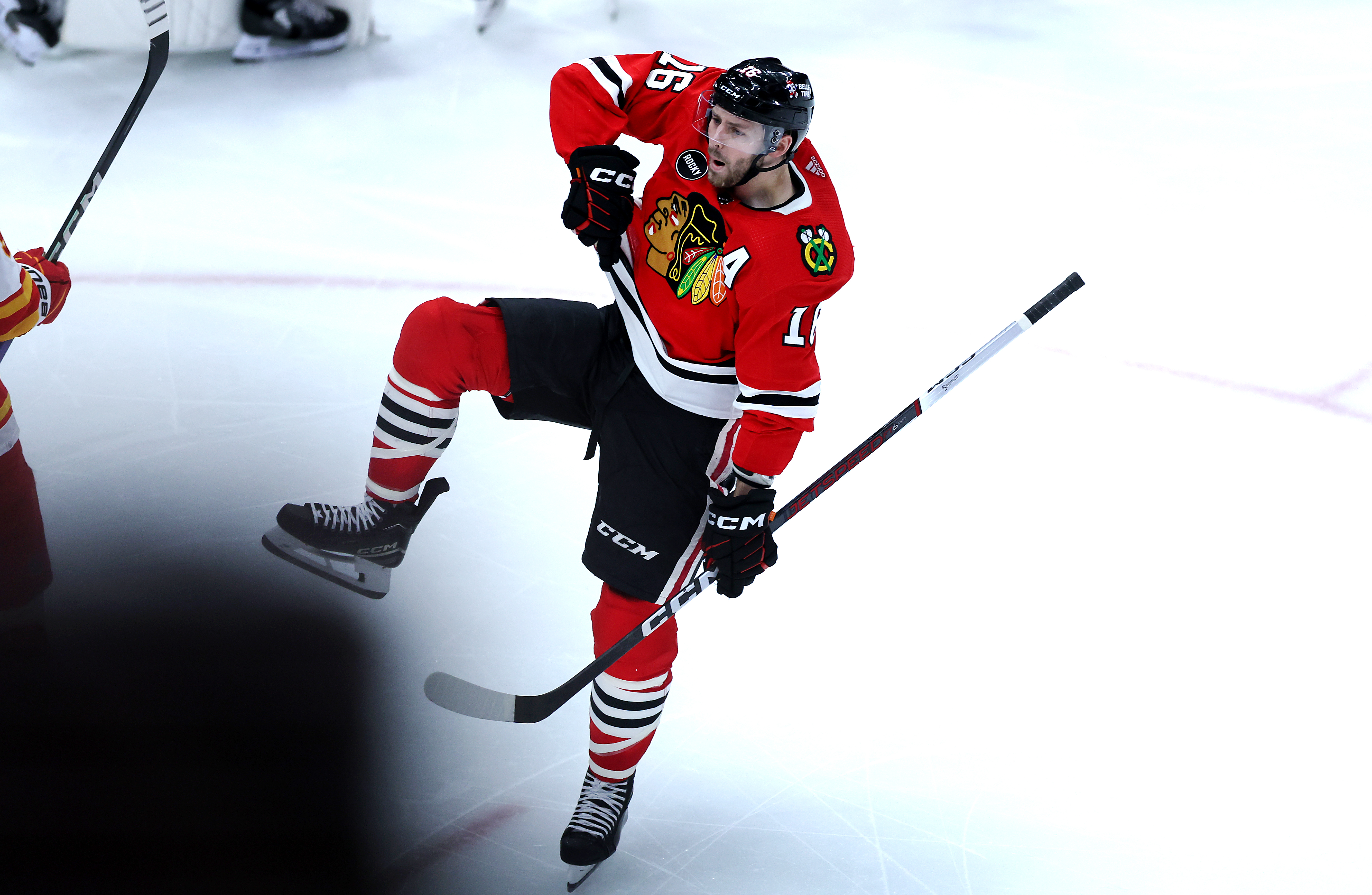 Chicago Blackhawks center Jason Dickinson (16) celebrates after scoring a goal in the third period of a game against the Calgary Flames at the United Center in Chicago on March 26, 2024. (Chris Sweda/Chicago Tribune)