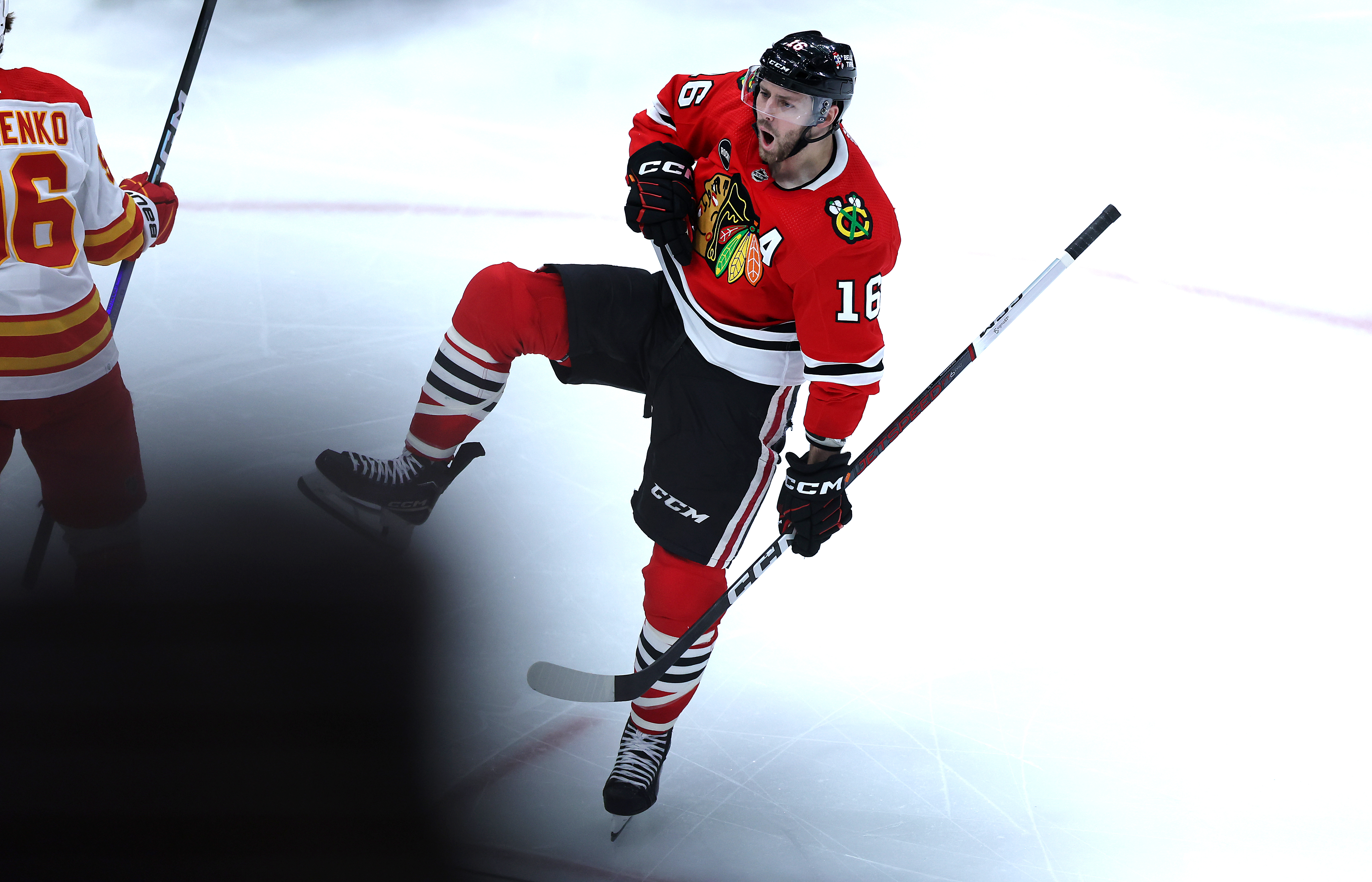 Chicago Blackhawks center Jason Dickinson (16) celebrates after scoring a goal in the third period of a game against the Calgary Flames at the United Center in Chicago on March 26, 2024. (Chris Sweda/Chicago Tribune)