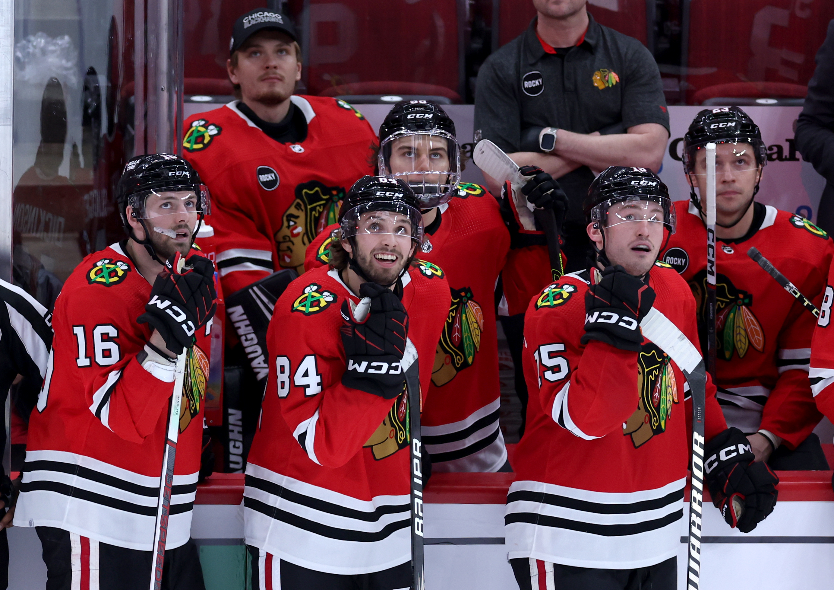 Chicago Blackhawks left wing Landon Slaggert (84) looks at the video board while awaiting a decision from the referees in the third period of a game against the Calgary Flames at the United Center in Chicago on March 26, 2024. After a review, the Slaggert's goal was disallowed. (Chris Sweda/Chicago Tribune)