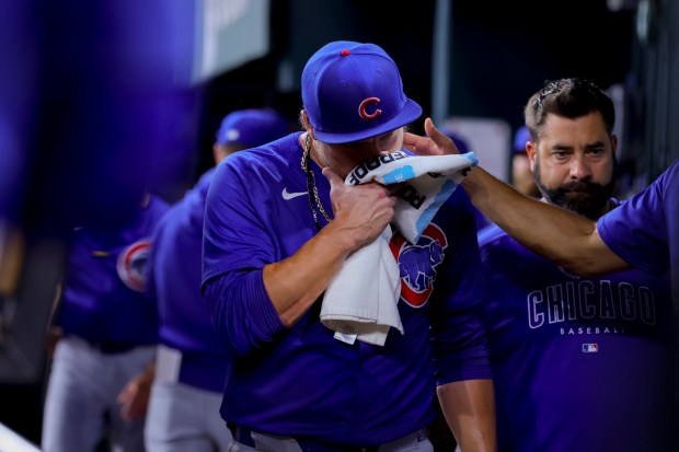 Cubs starting pitcher Justin Steele leaves after injuring his left leg during the fifth inning against the Rangers on March 28, 2024, in Arlington, Texas. (Gareth Patterson/AP)