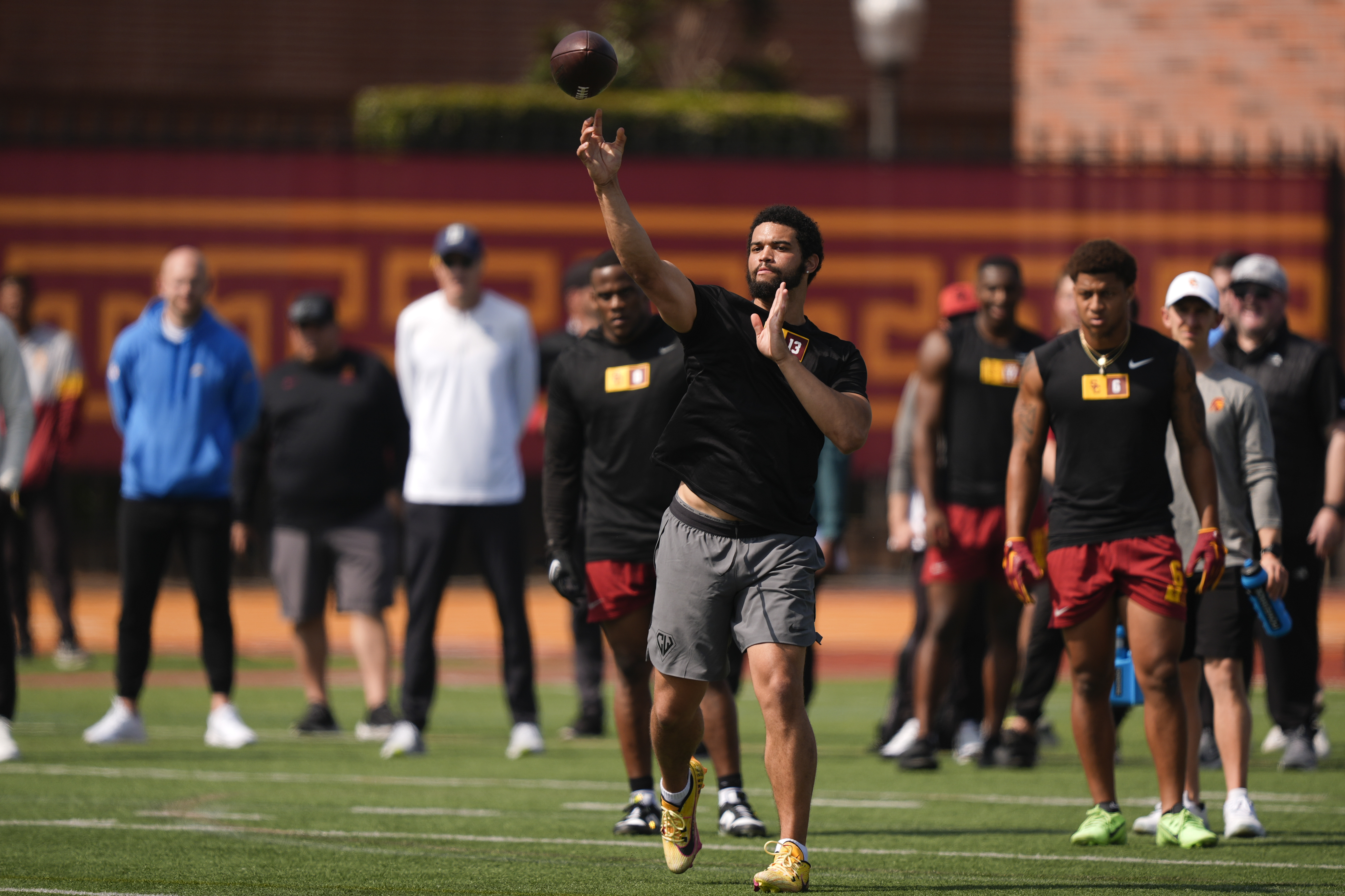 USC quarterback Caleb Williams warms up at the school's pro...