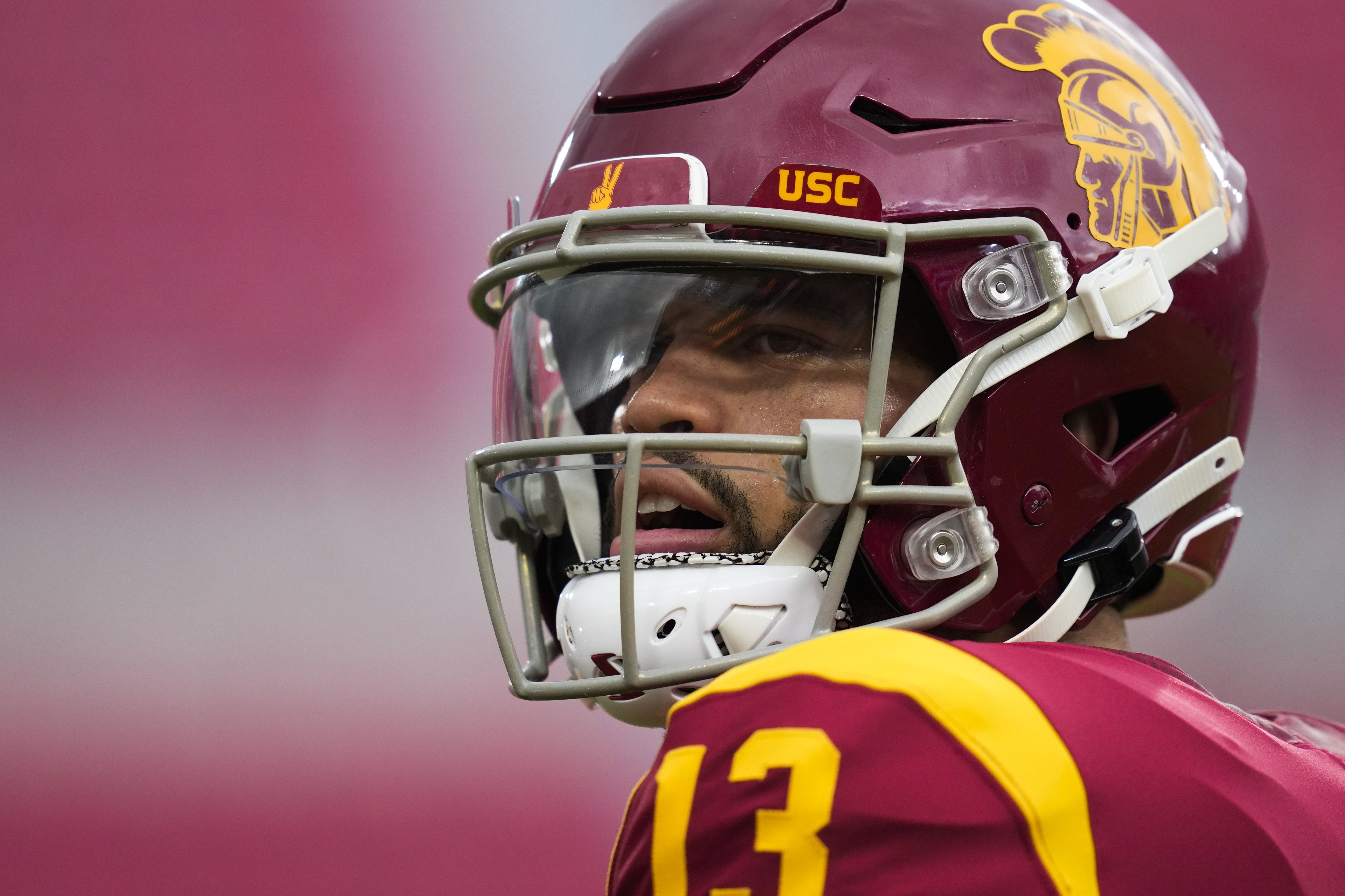 Southern California quarterback Caleb Williams (13) looks away as he...