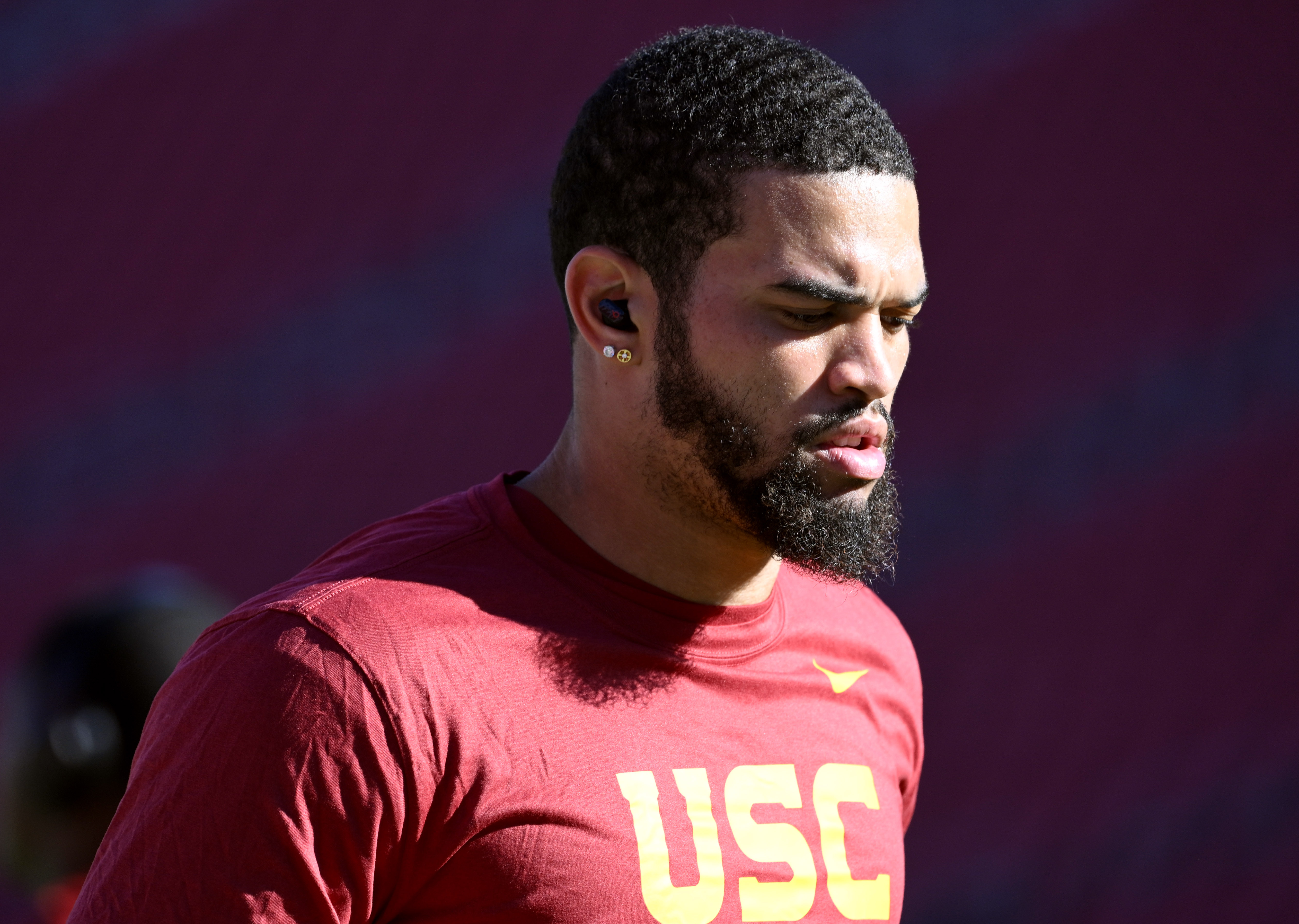 Quarterback Caleb Williams warms up for a game against Utah...