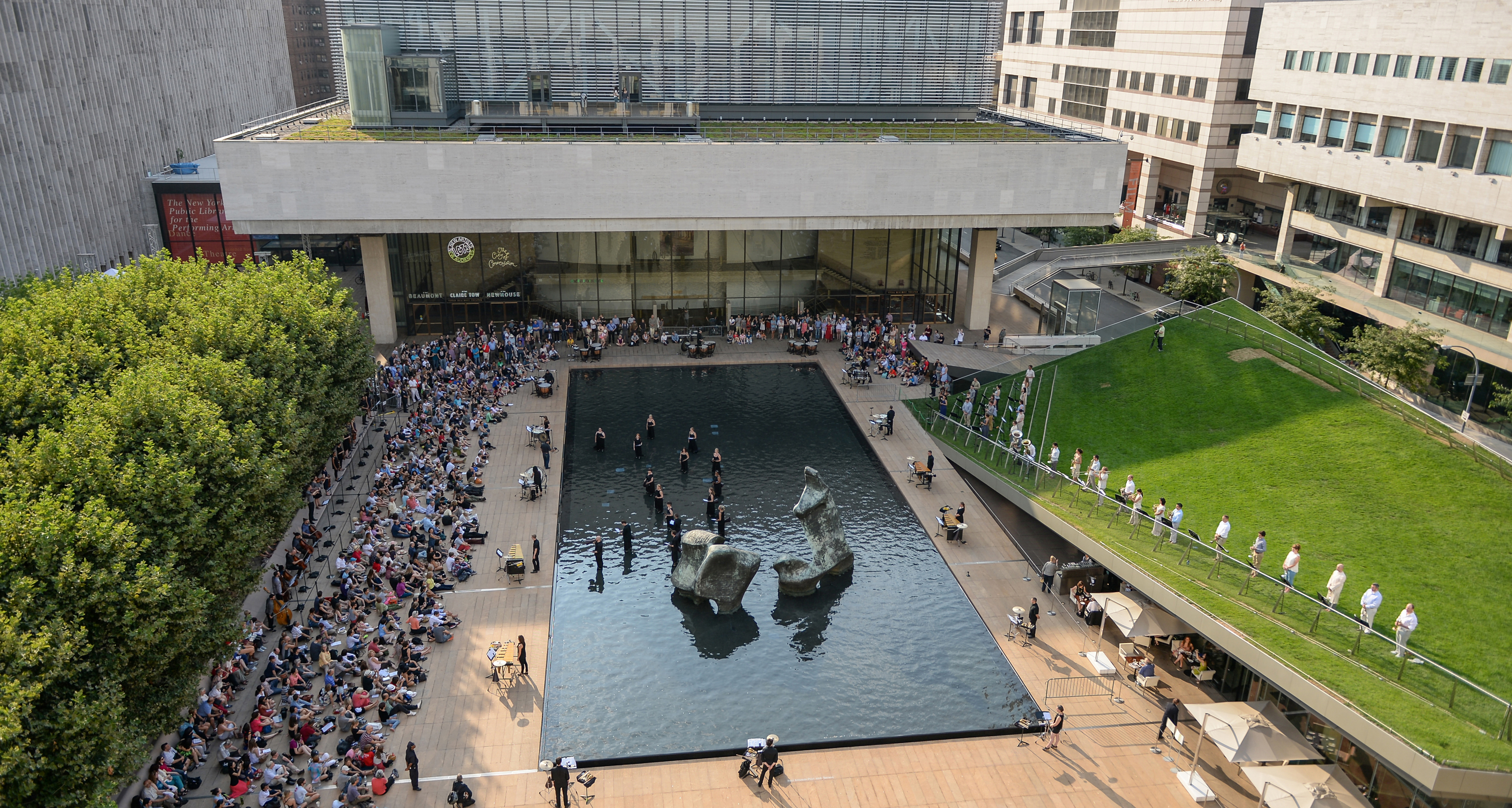 A plaza surrounded by grass