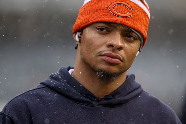 Bears quarterback Justin Fields warms up to face the Falcons on Dec. 31, 2023, at Soldier Field. (Brian Cassella/Chicago Tribune)