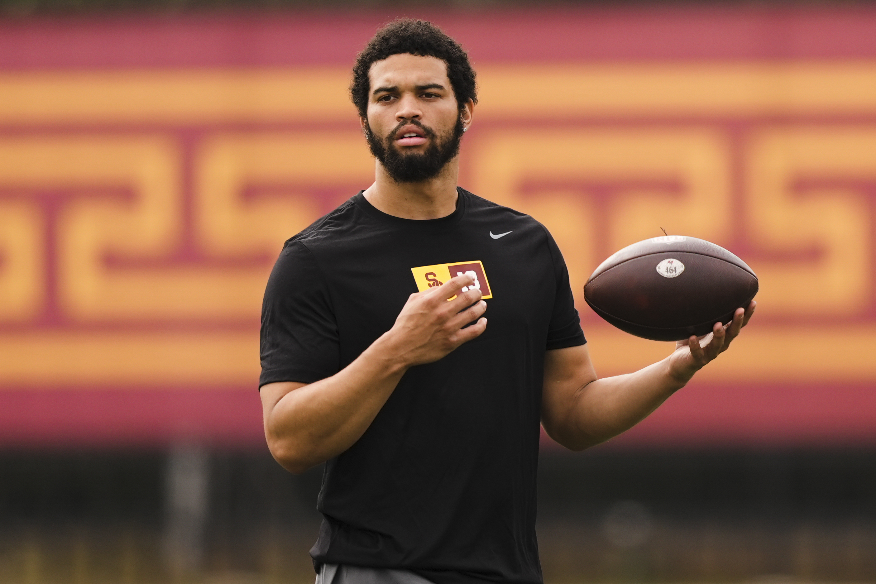 USC quarterback Caleb Williams warms up at the school's pro...