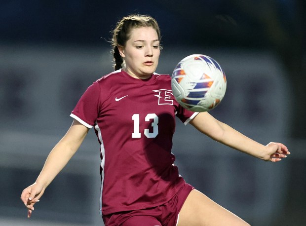 Elgin's Izzie Castro (13) bumps the ball as she defends against Glenbard North during an Upstate Eight Conference match on Tuesday, April, 9, 2024. The match ended in a scoreless tie.H. Rick Bamman / For the Beacon News