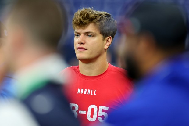 Michigan quarterback J J McCarthy looks on during the NFL combine at Lucas Oil Stadium on March 2, 2024, in Indianapolis. (Stacy Revere/Getty Images)