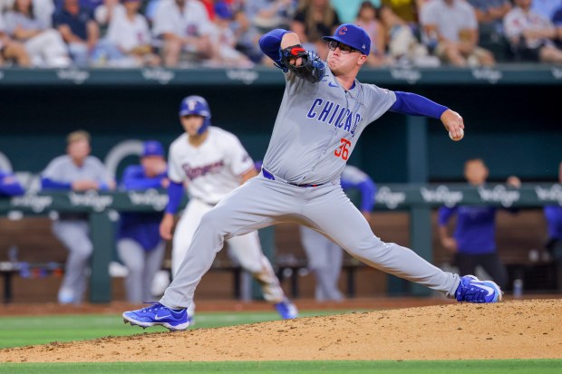 Chicago Cubs starting pitcher Jordan Wicks delivers a pitch during the forth inning of a baseball game against the Texas Rangers, Sunday, March 31, 2024, in Arlington, Texas. (AP Photo/Gareth Patterson)