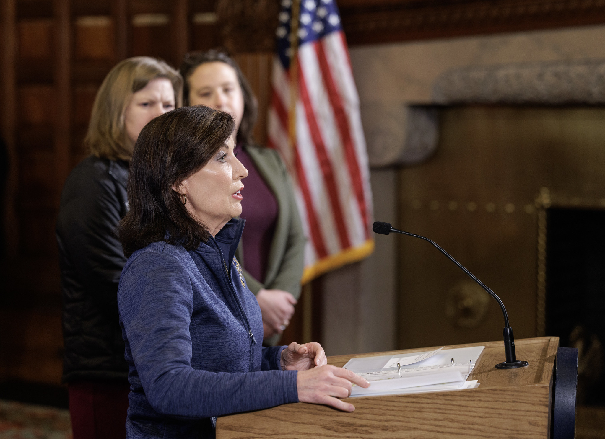 Gov. Kathy Hochul makes an announcement from a lectern