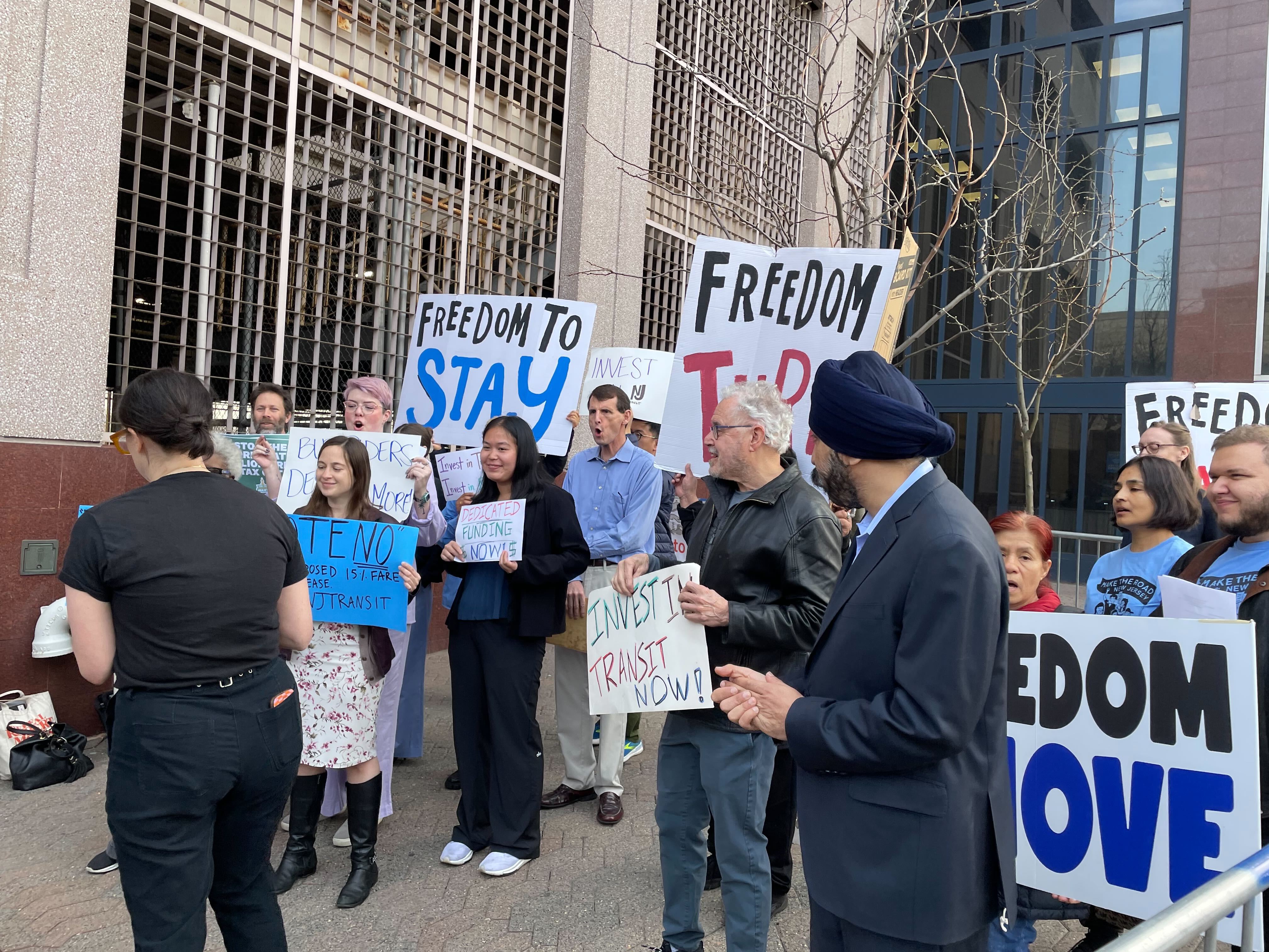 Protesters demonstrate outside an NJ Transit hearing in Newark, where the agency's board agreed to a 15% fare hike.