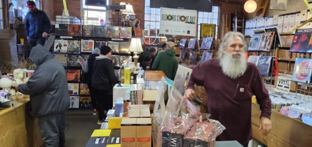 Customers begin to file into the Kiss the Sky record shop in Batavia at 7 a.m. Saturday when sales for Record Store Day officially began. (David Sharos / For The Beacon-News)