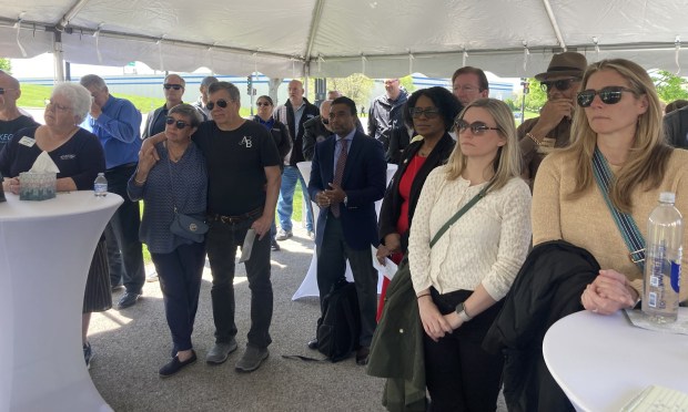 Team AB and community members paid tribute to the four men killed when one of the company's buildings exploded five years ago Friday. (Steve Sadin/Lake County News-Sun)