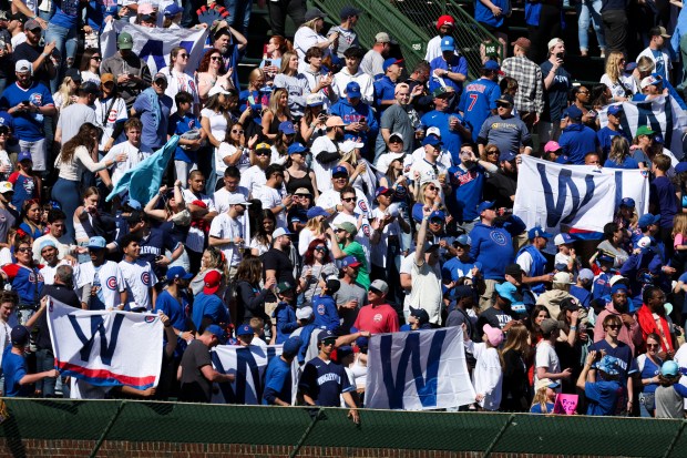 Chicago Cubs fans celebrate after the Chicago Cubs beat the Milwaukee Brewers at Wrigley Field on May 5, 2024. (Eileen T. Meslar/Chicago Tribune)