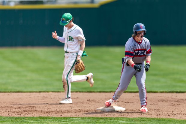 St. Rita's Peyton Panozzo reacts after getting double during a Catholic League Blue game against Providence in New Lenox on Saturday, May 4, 2024. (Vincent D. Johnson/for the Daily Southtown)