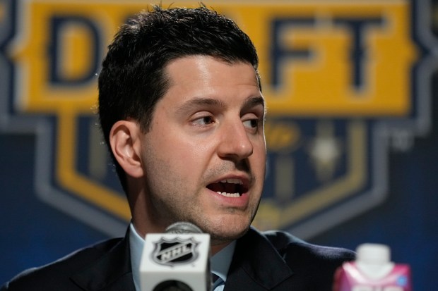 Blackhawks general manager Kyle Davidson responds to questions after the second day of the NHL draft on June 29, 2023, in Nashville, Tenn. (AP Photo/George Walker IV)