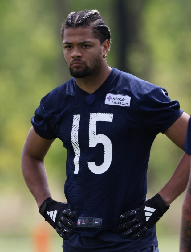 Wide receiver Rome Odunze watches teammates work out during Bears rookie minicamp on May 11, 2024, at Halas Hall in Lake Forest. (John J. Kim/Chicago Tribune)