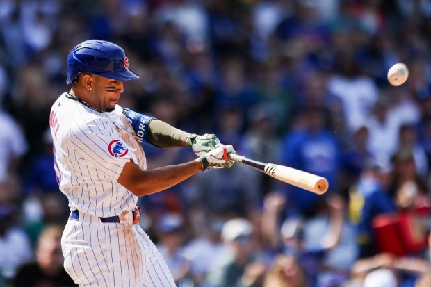 Chicago Cubs third base Christopher Morel hits a sacrifice fly during the sixth inning against the Pittsburgh Pirates at Wrigley Field on May 19, 2024. (Eileen T. Meslar/Chicago Tribune)