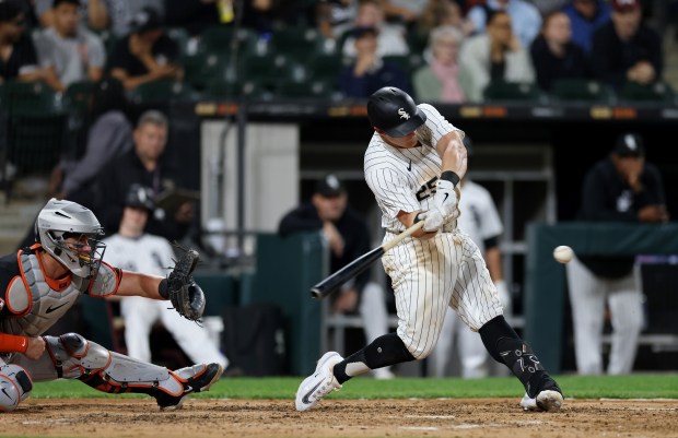 White Sox first baseman Andrew Vaughn (25) swings for an RBI double in the fifth inning against the Orioles at Guaranteed Rate Field on May 24, 2024, in Chicago. (John J. Kim/Chicago Tribune)