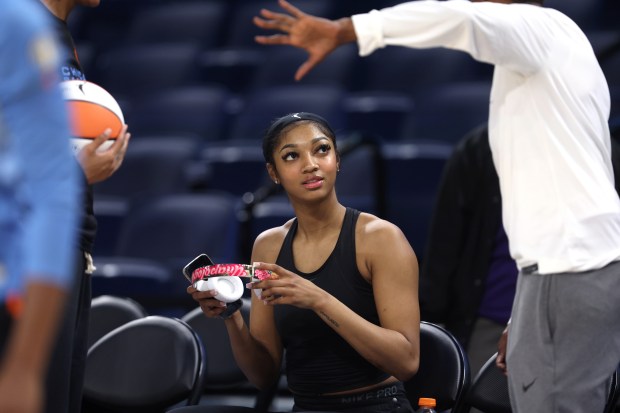 Chicago Sky forward Angel Reese prepares to warm up for the Sky's home opener against the Connecticut Sun at Wintrust Arena in Chicago on May 25, 2024. (Chris Sweda/Chicago Tribune)