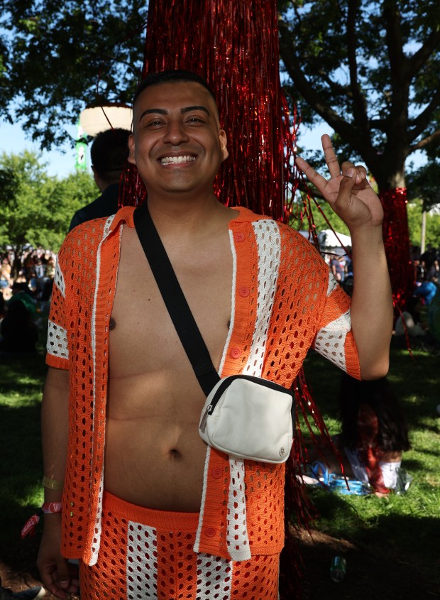 Alex Bejar, 27, poses for a portrait at the Sueños Music Festival at Grant Park on May 25, 2024, in Chicago. (John J. Kim/Chicago Tribune)