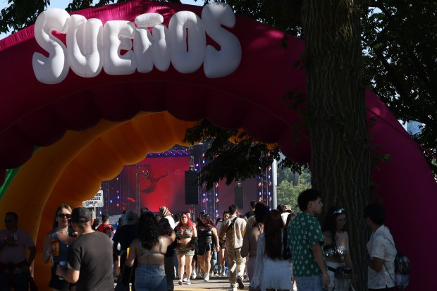 Concertgoers walk through inflatable arches during the Sueños Music Festival at Grant Park on May 25, 2024, in Chicago. (John J. Kim/Chicago Tribune)