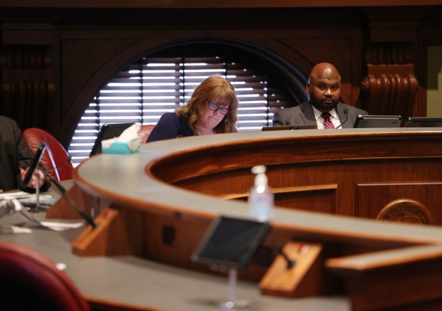 Sen. Elgie R. Sims Jr.(D-Chicago), right, chairs a committee hearing at the Capitol on Wednesday, Feb. 7, 2024, in Springfield. (Stacey Wescott/Chicago Tribune)