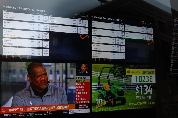 Betting lines for sporting events are displayed on screens at Over/Under sports bar, a FanDuel sportsbook location, in the 2700 block of North Halsted Street on Feb. 8, 2023, in Chicago. (John J. Kim/Chicago Tribune)