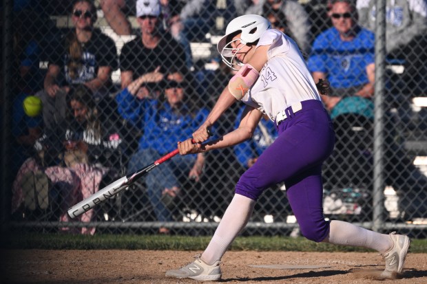 Hobart's Emili Knestrict swings at a Lake Central pitch in the Class 4A regional on Thursday, May 30, 2024. (Kyle Telechan/for the Post-Tribune)