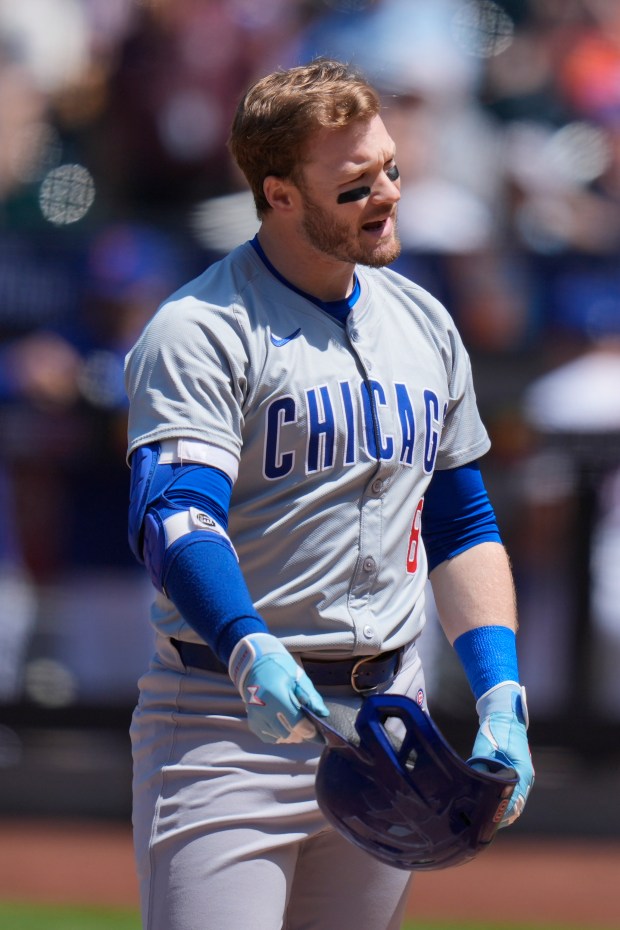 The Cubs' Ian Happ reacts after striking out during the first inning against the Mets on Thursday, May 2, 2024, in New York. (AP Photo/Seth Wenig)