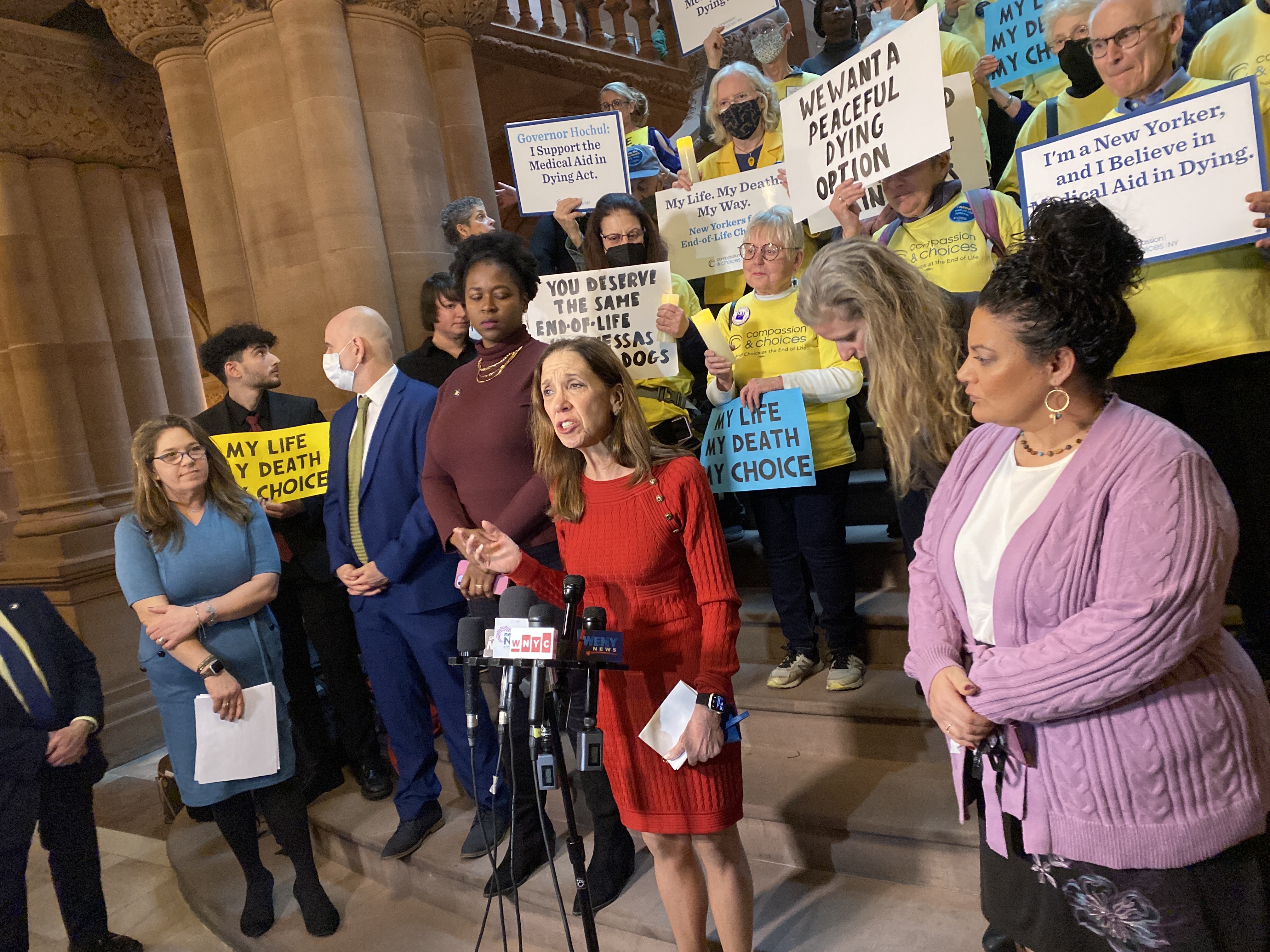 Assemblymember Amy Paulin and supporters of the Aid in Dying legislation hold a rally at the state Capitol in Albany.