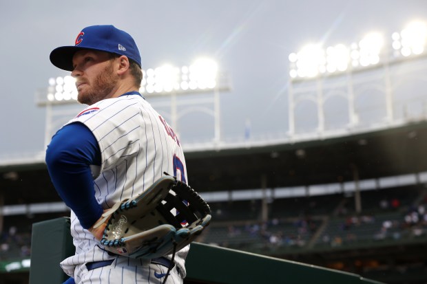 Cubs left fielder Ian Happ waits to take the field for a game against the Astros on April 23, 2024, at Wrigley Field. (Chris Sweda/Chicago Tribune)