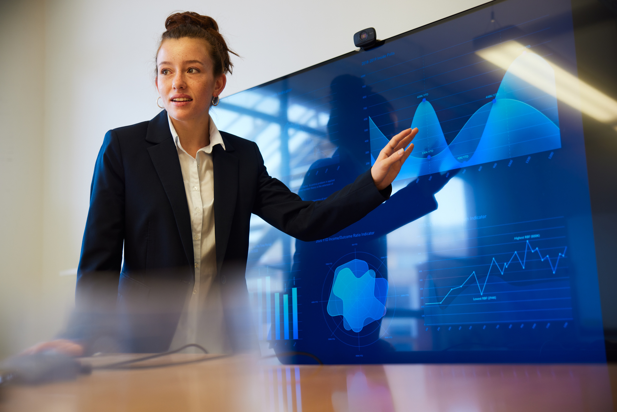 a woman explains her PowerPoint