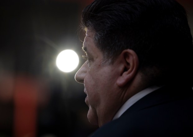 Gov. J.B. Pritzker answers questions as developers and government officials celebrated the start of renovation construction on May 6, 2024, at the Thompson Center. (Brian Cassella/Chicago Tribune)