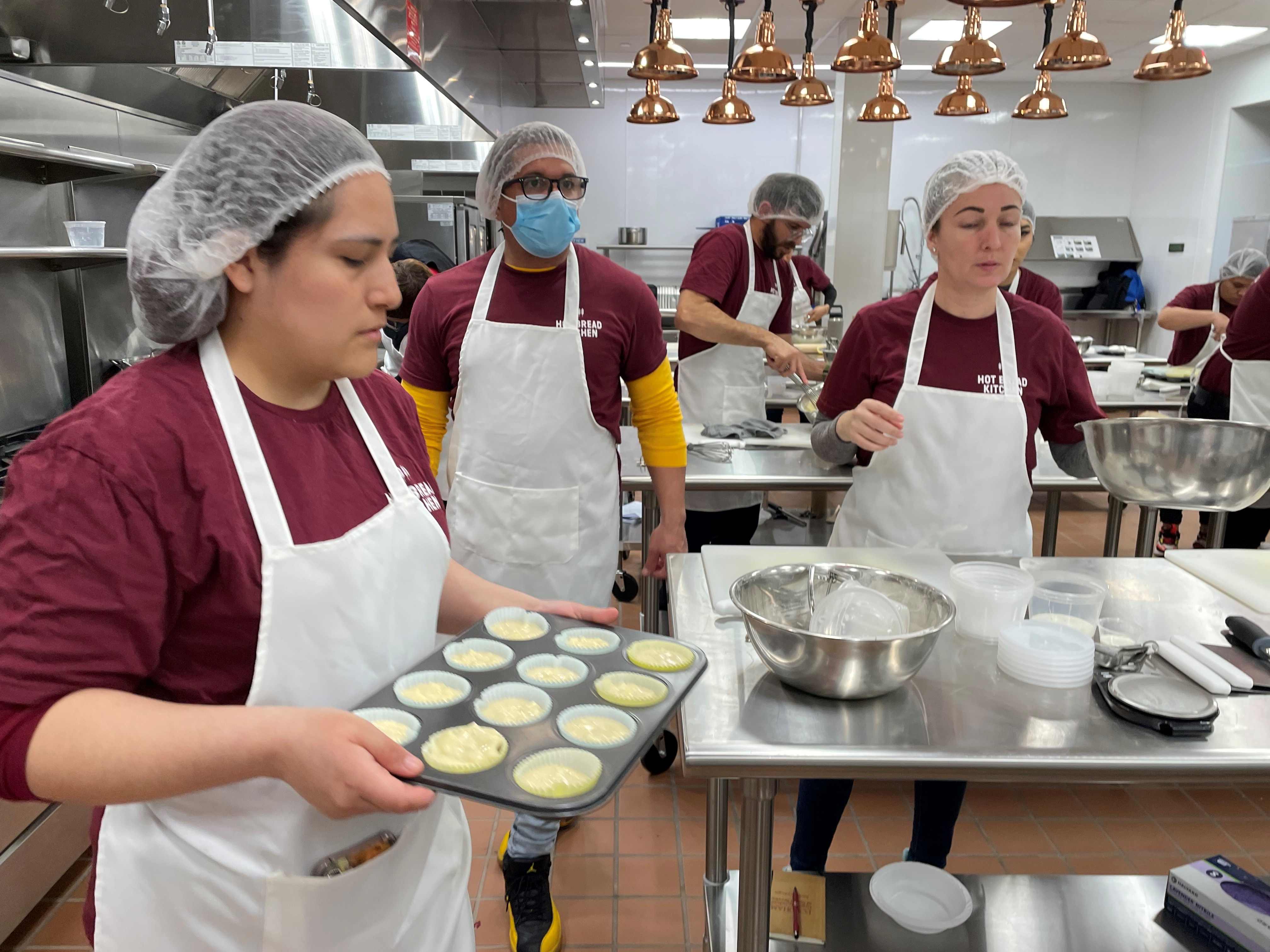 The scene at City Harvest in Brooklyn, hosting the five-week course “Culinary Career Pathways for New New Yorkers,” launched in April by the nonprofit group Hot Bread Kitchen, which trains New Yorkers for jobs in the food industry.