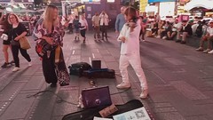 Kyotaro (bass guitar) & Misha (violin) in Times Square NYC, May 21, 2024