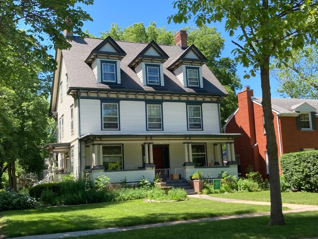 Among the ways Flossmoor is marking its 100th anniversary of incorporation is placing signs recognizing homes in the village that are 100 years old or more, such as this home on Sterling Avenue near downtown Flossmoor. (Paul Eisenberg/Daily Southtown)