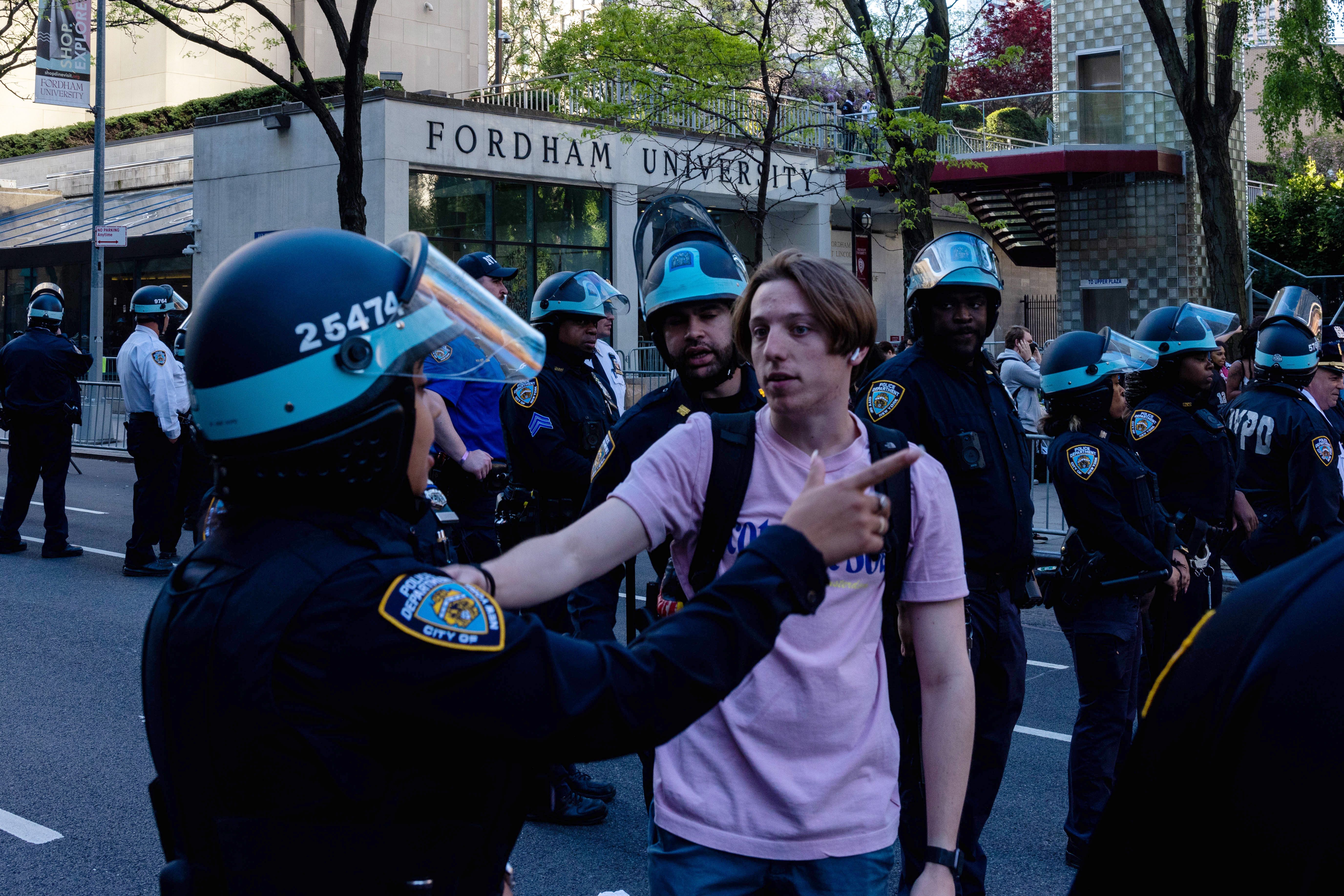 Members of the NYPD redirect traffic as police arrest pro-Palestinian protesters occupying a building where they had established an encampment at Fordham University Lincoln Center campus on May 1, 2024.