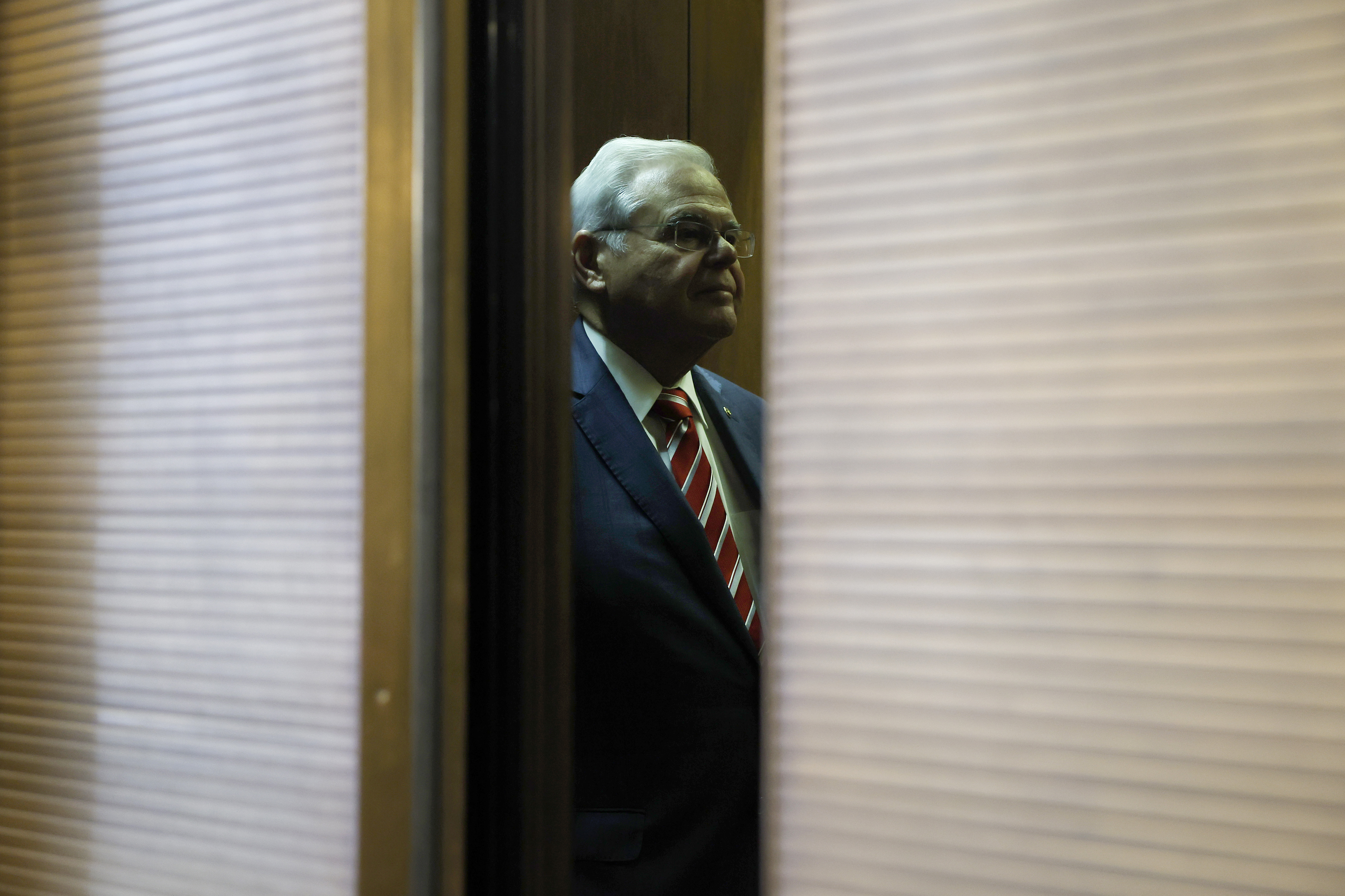 Sen. Bob Menendez stands in an elevator after leaving his office in the Hart Senate Office Building on Sept. 28, 2023.