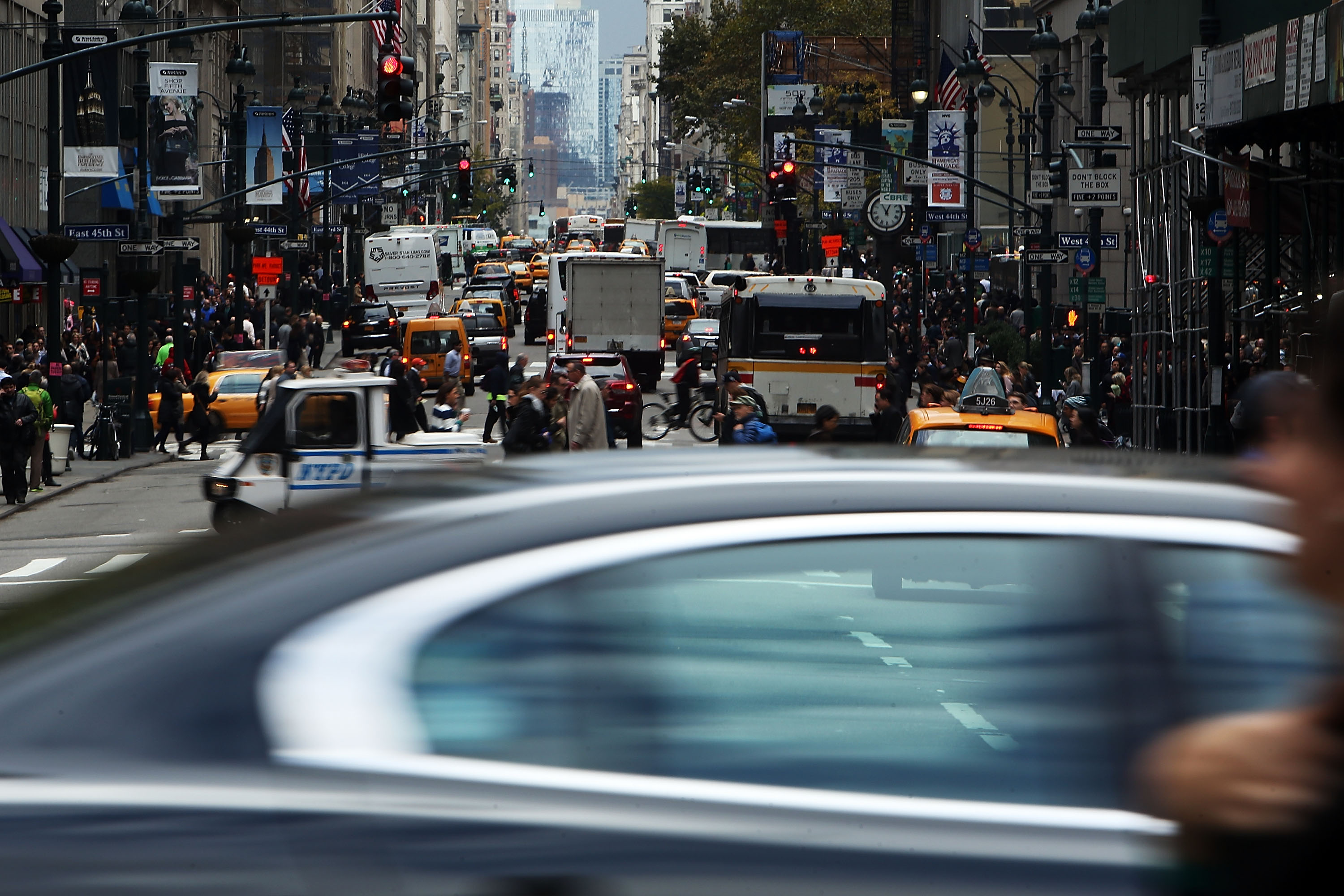 Fast cars in New York City.