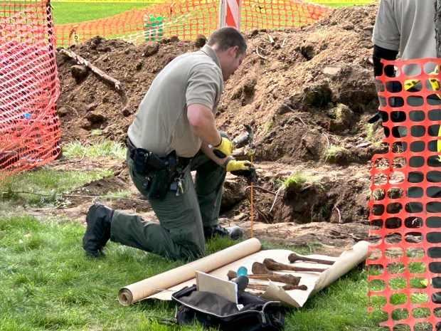 Between May 15 and 17, law enforcement officials worked to remove human remains from dirt excavated by crews working to repair water lines in Yorkville. (Lisa Wolancevich)