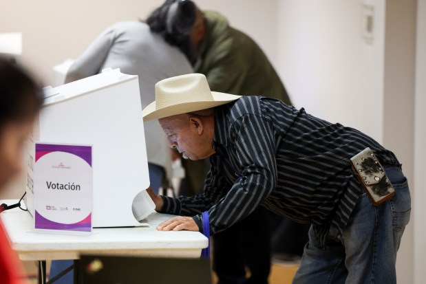 A person votes in the Mexican presidential election at the Consulate General of Mexico in Chicago on June 2, 2024. (Eileen T. Meslar/Chicago Tribune)