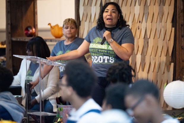 Curriculum coordinator Krystal Madden speaks during a graduation ceremony for Faith Farm and orchard's Next Urban Ag Generation class on Saturday, June 1, 2024. (Kyle Telechan/for the Post-Tribune)