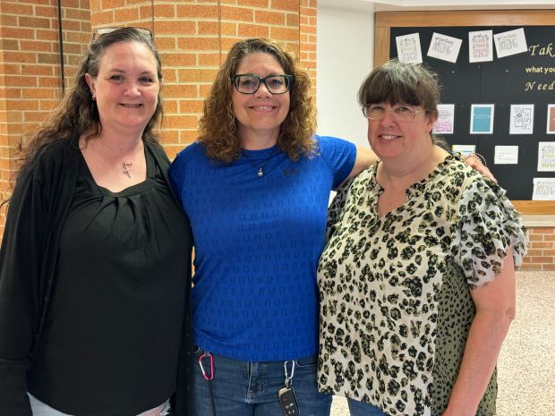 Cindy Jackson, Tina Carey and Jennifer Flitter, all of whom graduated in 1990, gather for a final walkthrough of their old school on Saturday, June 1, 2024. The former Chesterton High School, which became Chesterton Middle School in 2001, is no longer serving as a school. It will next be used by the local YMCA. (Doug Ross/for Post-Tribune)