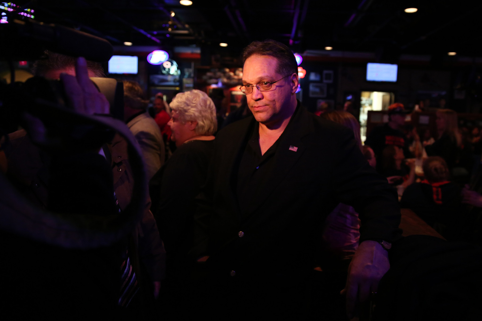 Former Bears player and Romeoville mayoral candidate Steve McMichael waits...