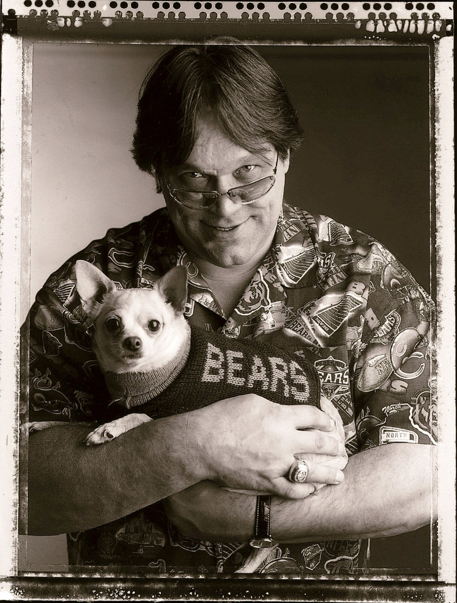 A portrait from 2005 of Steve McMichael with his dog...