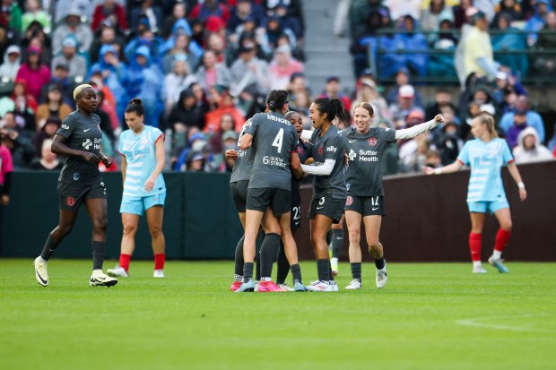 Bay FC players celebrate after scoring during the game against the Chicago Red Stars at Wrigley Field on June 8, 2024. (Eileen T. Meslar/Chicago Tribune)