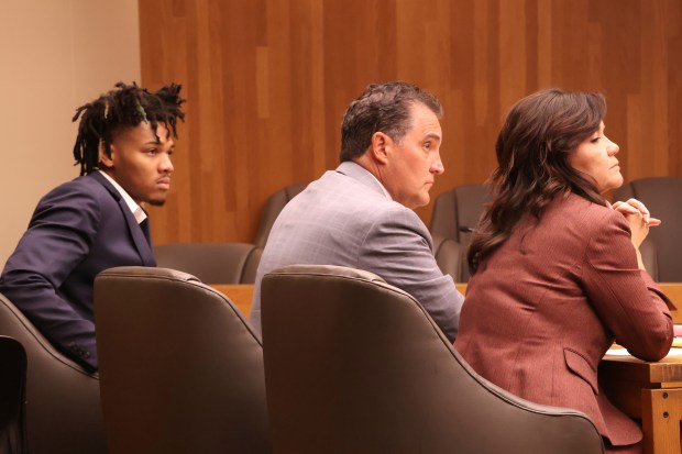 University of Illinois basketball player Terrence Shannon Jr., left, in court with attorneys Tricia Bath and Mark Sutter during his trial on June 12, 2024, in Lawrence, Kansas. Shannon, of Champaign, is accused of committing sexual assault on Sept. 9, 2023, in Lawrence. (Chris Conde/The Lawrence Journal-World)